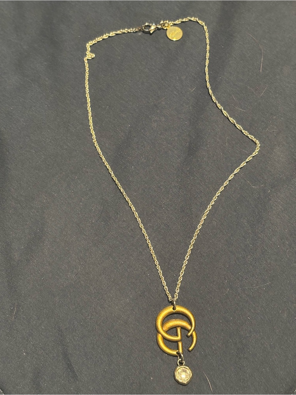 Idlewild Gold-Tone Interlocking Pendant Necklace with Charm